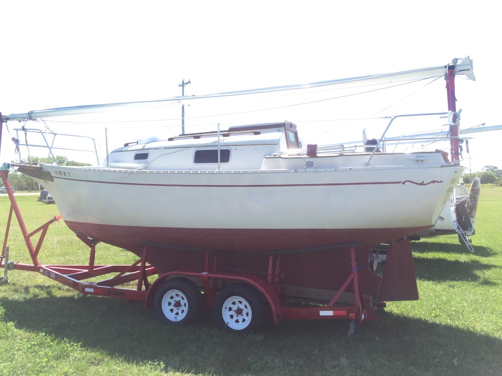 Tulia as she sat in a field in Madison WI. After unsuccessfully attempting to sell it, they had dropped the price to $15,000, which we were able to negotiate lower.